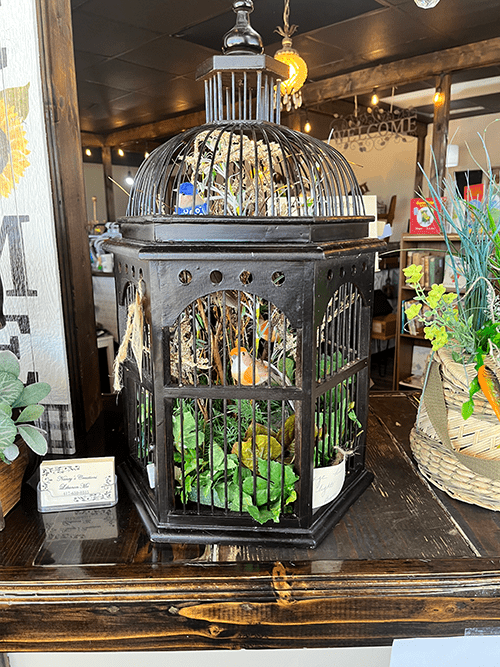 Beautiful Birdcage with Decorative Foliage and Birds
